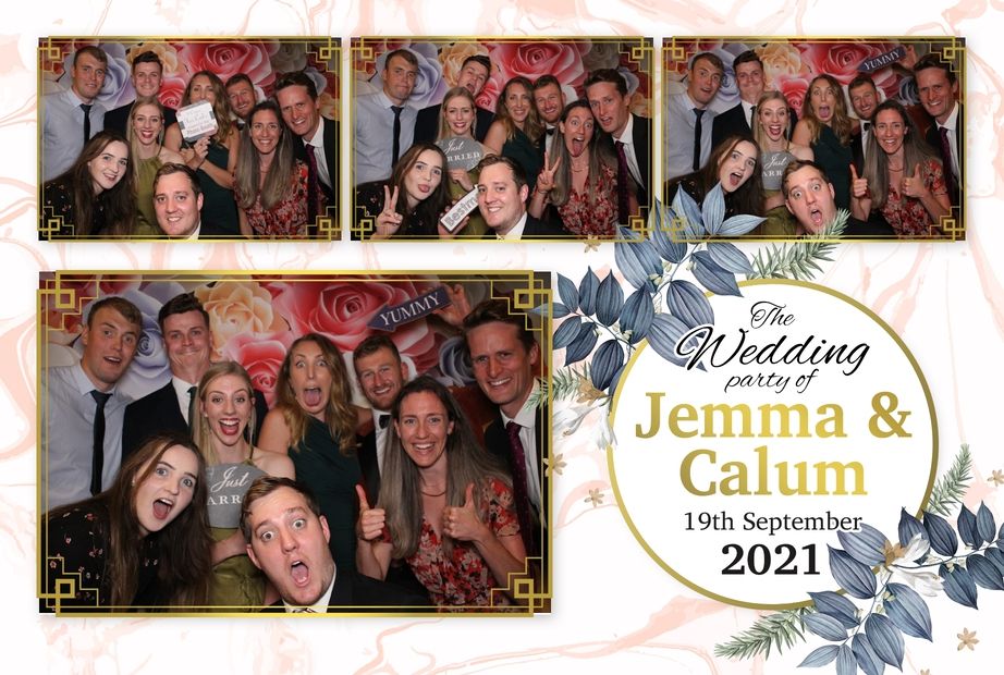 Wedding guests piling in the photo booth for some great shots