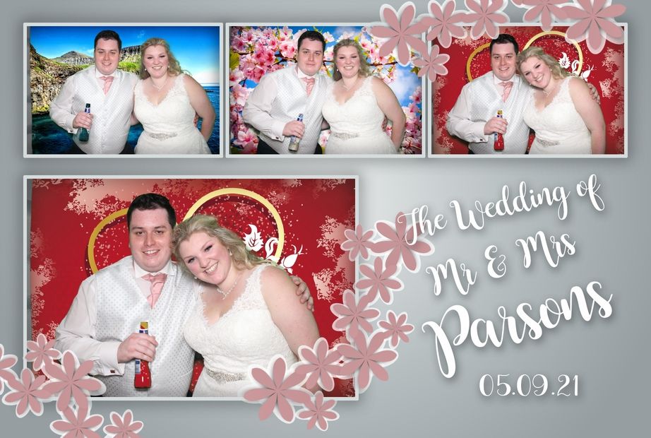 The bride and groom posing in the inflatable photo booth hire in Bristol