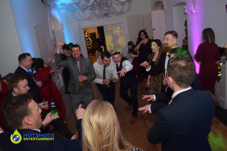 The rugby lads on the dance floor at a wedding