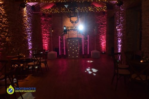 Wedding disco set up at The White Horse Barn in Hambrook. March 2020 wedding in a barn.