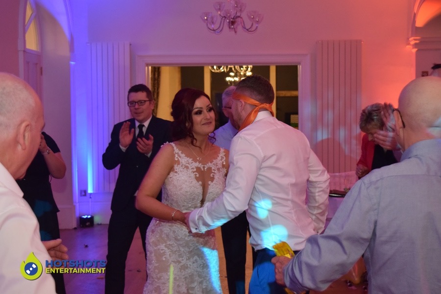 The bride and groom look so happy on the dance floor