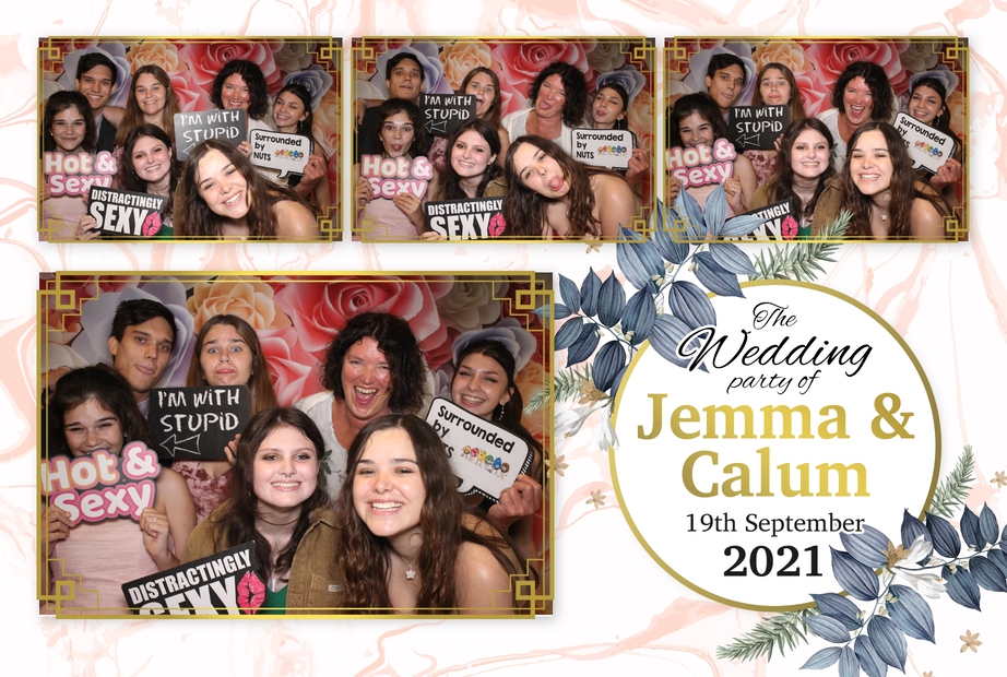 Wedding guests in the rustic photo booth